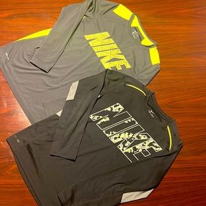2 youth large Nike long sleeve dri-fit shirts. maybe used once